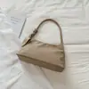 Bolso de axila de nicho estilo coreano para mujer, moda de tendencia nuevo para principios de otoño de 2026, bolso de mano y bolso de hombro elegantes de lujo ligero
