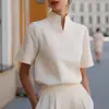 Sitio independiente de Amazon transfronterizo 2026 Popular en Europa y América camisa de color liso con cuello alto elegante casual nuevo estilo chino top para mujer