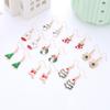 Aretes de Navidad Aretes de botón de Navidad Copo de nieve Año Nuevo Dibujos animados Árbol de Navidad Aretes colgantes Lote mixto Elementos navideños