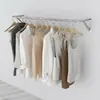 Arara de parede para loja de roupas Arara de parede lateral para pendurar roupas Prateleira de parede para roupas infantis Cabide de parede para roupas femininas