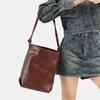 Primavera 2025 Nova bolsa de nicho Moda Commuter Grande capacidade Balde Bolsa de ombro de alta qualidade Bolsa de axila