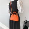 Bolso de concha retro de estilo coreano para mujer, nuevo bolso de hombro sencillo de moda de primavera 2023, bolso de mensajero informal portátil para viajes de trabajo