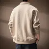 Suéter de punto de manga larga jacquard de alta gama estilo francés con patrón de diamantes para hombre, con un diseño texturizado de corte holgado, cuello alto y forro polar, perfecto para otoño