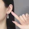 Pendientes largos de zircón vintage transfronterizos europeos y americanos, moda de lujo ligero, nicho, únicos, exagerados, pendientes de alta gama para mujer