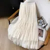 Foto real de saia feminina de retalhos de renda, novo estilo outono e inverno 2026, saia longa evasê modeladora, saia bufante, saia de bolo de tule
