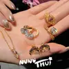Set de Alta Costura de Joyería Estrella Brillante Olas de Río Estrelladas Anillo Huevo de Paloma de 4 Quilates Ojo de Ochema Europeo Antiguo Pendientes de Diamante Centelleantes