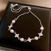 Pulsera de Hilo con Flor de Zircón Súper Brillante en Forma de Diamante y Perla, Pulsera de Lujo Ligero y de Gama Alta, Joyería de Mano Estilo Retro Francés