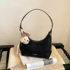 Bolsa Feminina Texturizada de Alto Padrão Transfronteiriça Nova Coleção Primavera 2026 Design de Nicho Simples Bolsa de Ombro ou Axila Bolsa Dumpling