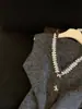 Colete Tricot Decote V Lantejoulas Miçangas Indústria Pesada Feminino Outono 2026 Cinza Cardigan Laço Slim Camada Superior