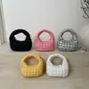 Bolsa de Hombro Portátil de Nube Súper Popular de Nicho para Mujer 2025 Nueva Ligera y Versátil con Diseño de Rejilla de Burbujas