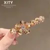 Novo e requintado grampo de cabelo de flor de cristal, ferramenta moderna e elegante para arrumar franjas e cabelos soltos, estiloso grampo jacaré