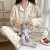 Comercio exterior transfronterizo nueva moda primavera pijamas mujer manga larga primavera y otoño dulce traje de ropa para casa una generación de cabello