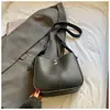 Bolso Pequeño Nuevo Primavera 2026 para Mujer, Bolso de Hombro Cruzado Moderno y Sencillo, Bolso Cubo Retro para el Trabajo
