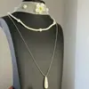 Colar de pérolas corrente de suéter clavícula design sense nicho luxo leve socialite simples versátil colar em camadas estilo old money