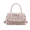 Bolso de nicho estilo coreano con lazo para mujer, nuevo modelo 2026, bolso de hombro cruzado, bolso de mano de lunares de alta gama, bolso cuadrado pequeño