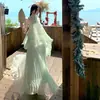 Vestido romántico estilo francés sin espalda con cuello halter con un chal de hada para vacaciones de verano en la playa en chifón rosa agua y verde lago