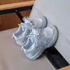 Zapatos de entrenamiento alemanes zapatos deportivos niños niñas nuevo estilo coreano Zapatos Argan primavera lazo nudo superficie de malla lindo caricatura zapatos para niños