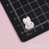 Mini trébol de cuatro hojas brillante de dibujos animados conejo Miffy accesorios de resina para manualidades pegamento de crema pinzas para el pelo gomas para el pelo fundas de teléfono pegatinas