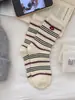 Calcetines de Piel de Visón con Calcetines de Terciopelo Rayados para Mujer, de Media Pantorrilla, Espesados Cálidos Otoño e Invierno Hebilla de Huevo Calcetines de Diseñador de Nicho