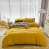 Oferta especial estilo luxo leve transmissão ao vivo conjunto de quatro peças cor sólida sono nu nórdico simples escovado amigo da pele fábrica de Nantong roupa de cama