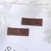 Etiquetas de Cuero de Microfibra, Etiquetas de Cuero con Cara Sonriente, Etiquetas de Costura Hechas a Mano para Bufandas, Sombreros, Accesorios para el Cabello, Gomas para el Cabello, Suministro Mayorista del Fabricante