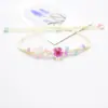 Pulseira de Flores Secas Mais Vendida Transfronteiriça Europeia e Americana Narciso Flor Imortal Espécime de Planta Pulseira Tecida à Mão com Contas de Arroz Borboleta