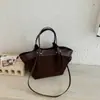Bolso tote vintage transfronterizo con un toque de alta gama, bolso de hombro de gamuza de gran capacidad, diseño de nicho, bolso de mano versátil para el día a día
