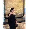 Nuevo estilo de principios de otoño, elegante y casual vestido con efecto capa, color negro liso