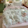 Conjunto de cuatro piezas de encaje de algodón puro estilo princesa coreana, conjunto de tres piezas de funda de edredón para dormitorio de algodón lavado estilo fresco y cremoso de Instagram