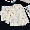 Conjunto de loungewear infantil estilo lapela, tecido fino para primavera e outono, cardigã de manga longa, pijama de algodão estilo coreano com estampa de nuvens para meninas