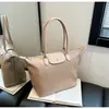 Bolsa de Hombro Directa de Fábrica Gran Capacidad para Mujer Bolso de Mano para Viajes Cotidianos Bolso de Hombro Simple Moderno
