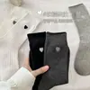 Calcetines sin costuras para mujer de primavera y verano, estilo japonés, color liso, bordado de corazón, borde con volantes, estilo universitario, algodón puro, calcetines de media pantorrilla
