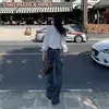 26 Anos de Novos Estilos Primavera e Verão, Cintura Média-Alta, Modelagem Justa, Levemente Solta, Textura de Bambu, Jeans Macio para Mulheres