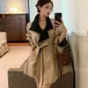 Gabardina chic transfronteriza con bloques de color, solapa y cierre de corbata para mujer, otoño, entallada a la cintura, corte holgado, abrigo elegante de alta gama, moderno