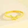Anillo abierto de nudo de mariposa de oro de arena vietnamita para mujer, moderno, simple, versátil, anillo ajustable, suministro mayorista para transmisión en vivo