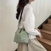 Bolso de Cubo con Cordón y Pompones de Moda para Mujer 2025 Nuevo Verano Casual Coreano Versátil Simple de Hombro Cruzado