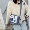 Comércio exterior Bolsa feminina 2020 nova bolsa quadrada pequena Versão coreana de bolsa mensageiro de ombro de nylon com contraste doce fresco uma geração de cabelo