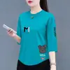 Comercio exterior transfronterizo ropa de maternidad, camiseta de manga tres cuartos y manga corta para mujer, estilo coreano, corte holgado, talla grande, top adelgazante de media manga, moda de Instagram