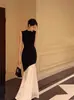 Dropshipping Francés Nuevo Vestido Negro Mujer Verano Sin Mangas Empalme Delgado Temperamento Cola de Pescado Tejido Falda Larga