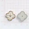 ABS estilo coreano blanco y negro trébol de cuatro hojas DIY pegamento de crema accesorios para joyería pequeños accesorios pendientes pasador de pelo agujero material para zapatos