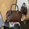 Bolsa de Boliche de Luxo de Nicho 2025 Feita de Couro Bovino de Primeira Camada com Design Plissado, Bolsa de Mão de Grande Capacidade para o Dia a Dia, Bolsa Transversal Tipo Concha