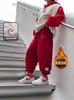 Pantalones Casuales Elegantes con Forro de Polar para Niños Otoño e Invierno 2025 Nuevos Pantalones de Chándal Festivos Rojos Integrados de Polar para Niños Invierno
