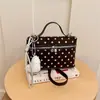 Bolso pequeño cuadrado tipo caja INS estilo coreano para mujer, bandolera individual, bolso de mano de lunares elegante popular este año, bolso tote pequeño, transfronterizo
