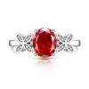 Transmisión en Vivo Más Vendido Anillo Huevo de Paloma Cortado Flor de Hielo de Piedra Preciosa de Color para Mujer Incrustado con Diamante de Alto Carbono Anillo de Mariposa Fabricante Dropshipping