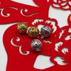 Campana hueca en forma de XI de aleación de plata de Xizang Campana de Palacio diy amor de pareja colgante de pulsera en forma de XI adornos de campana de boda