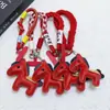 Huayang Año Nuevo Zodiaco Año Caballo Pu Llavero Decoración Bolso Serie Roja Lanyard Festivo para Teléfono Colgante de Bolsa