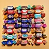 Balas de chocolate macias com recheio de suco, sabor chocolate, alta apresentação, dupla torção, embaladas individualmente. Doces para casamento no atacado e entrega.