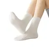 Calcetines deportivos de algodón de Xinjiang 10A antibacterianos para mujer, de tubo largo, color liso, para todas las estaciones, calcetines casuales transpirables, antibacterianos y resistentes al olor para mujer