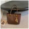 Bolso transfronterizo minimalista retro de gran capacidad, nuevo bolso de hombro casual y elegante para mujer, perfecto para el uso diario y para ir al trabajo.