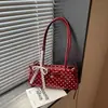 Bolsa de axila nicho transfronteiriça super quente feminina 2026 nova moda verão bolinhas bolsa baguette bolsa para trabalho e trajeto